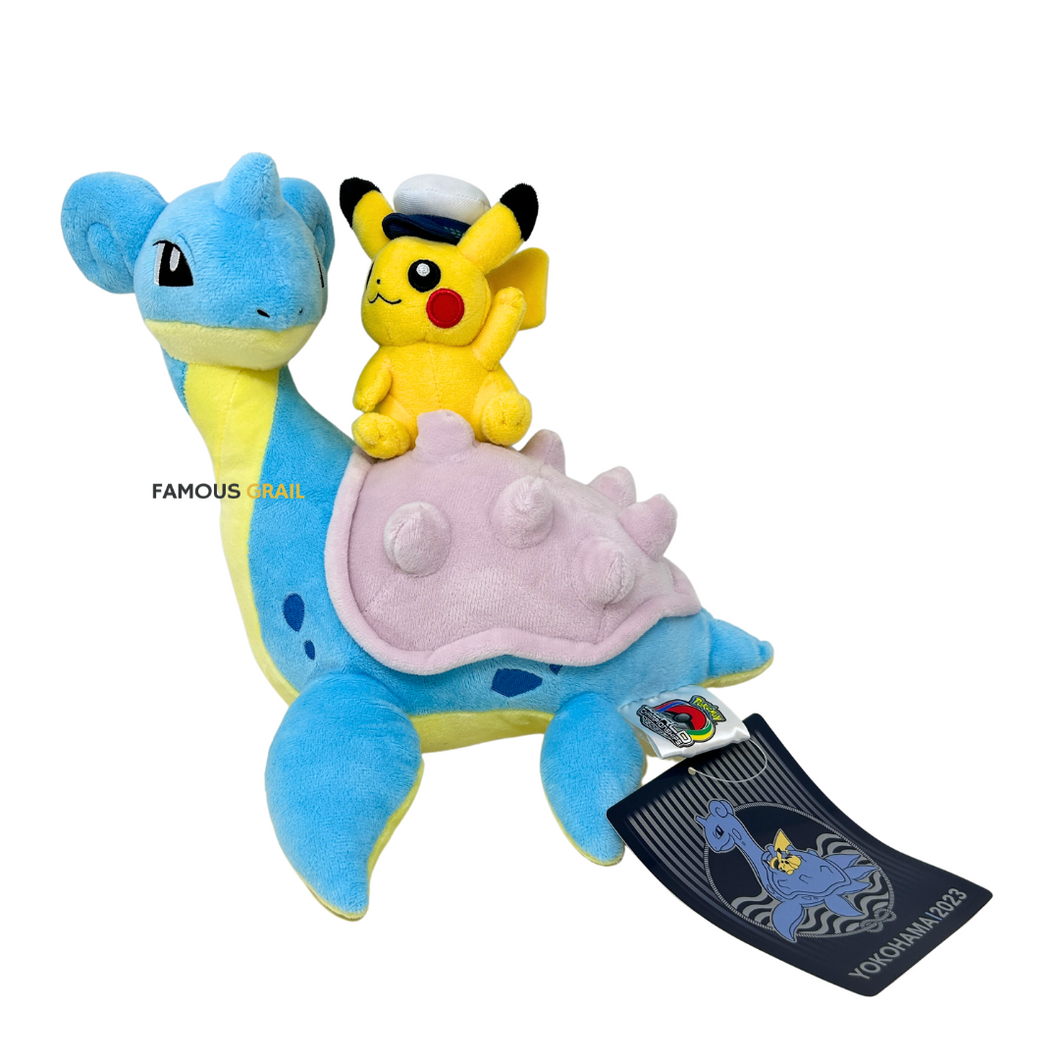 Pikachu riding top lapras plush